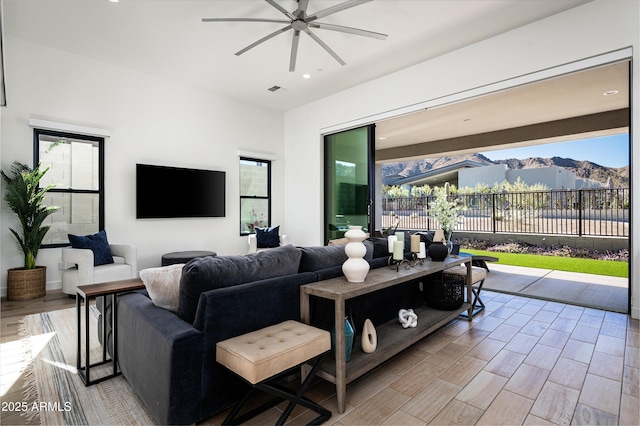 living room featuring ceiling fan