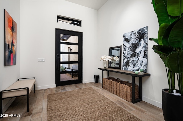 foyer entrance featuring light wood-type flooring