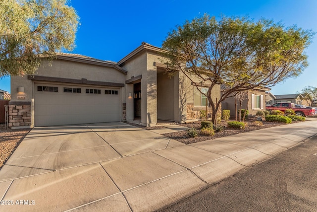 view of front of property with a garage