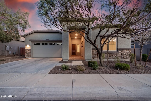 view of front of home with a garage