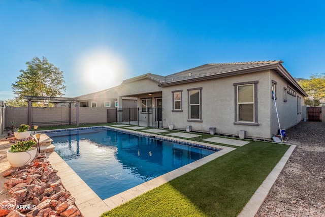 view of swimming pool with a pergola and a patio area