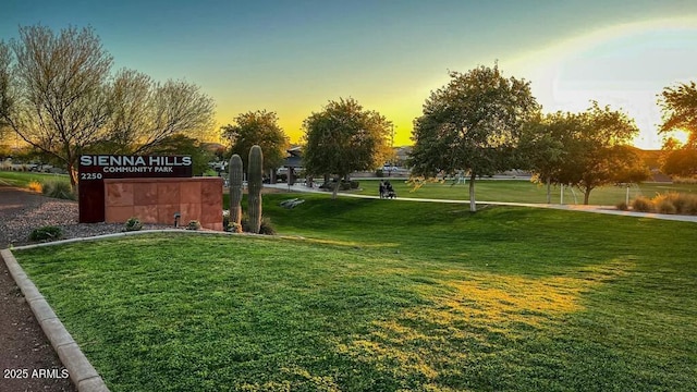 surrounding community featuring a lawn