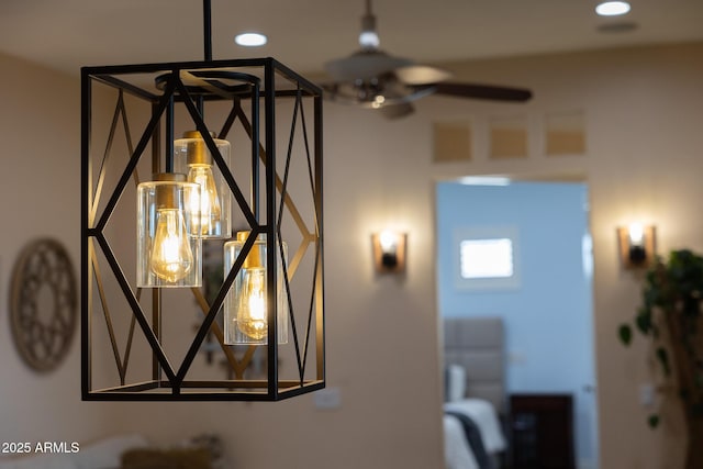 details with a ceiling fan and recessed lighting