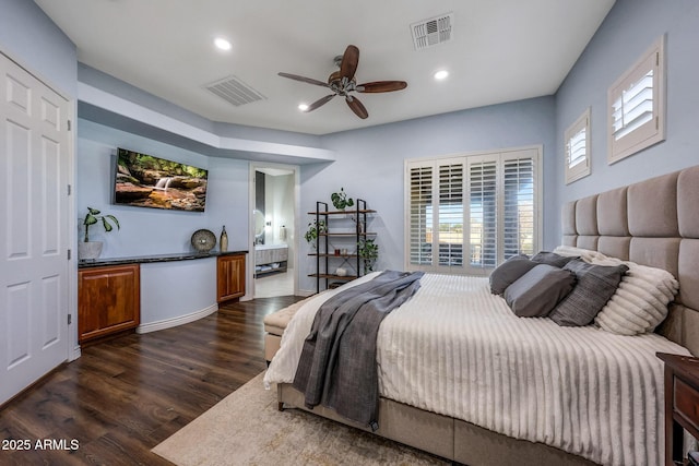 bedroom featuring ceiling fan, visible vents, dark wood finished floors, and recessed lighting