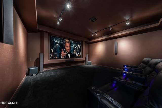 home theater room featuring carpet floors, baseboards, and visible vents