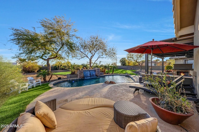 view of pool featuring a fenced in pool, an outdoor stone fireplace, a fenced backyard, and a patio