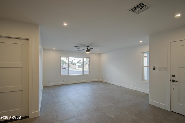 unfurnished room featuring ceiling fan