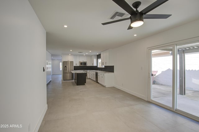 living room featuring ceiling fan