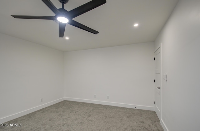 empty room with light carpet and ceiling fan