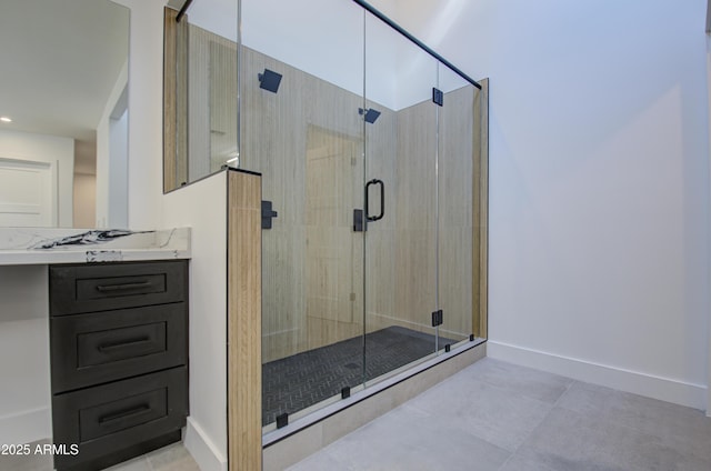 bathroom with vanity and an enclosed shower