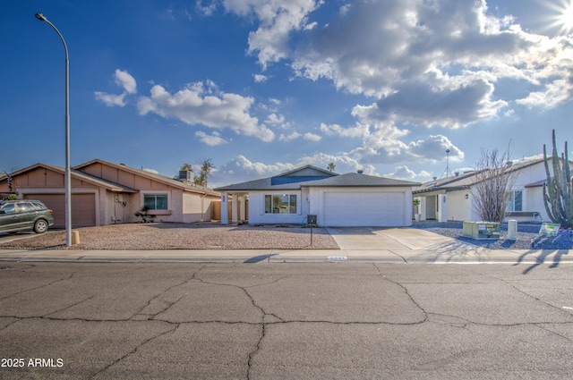 single story home featuring a garage