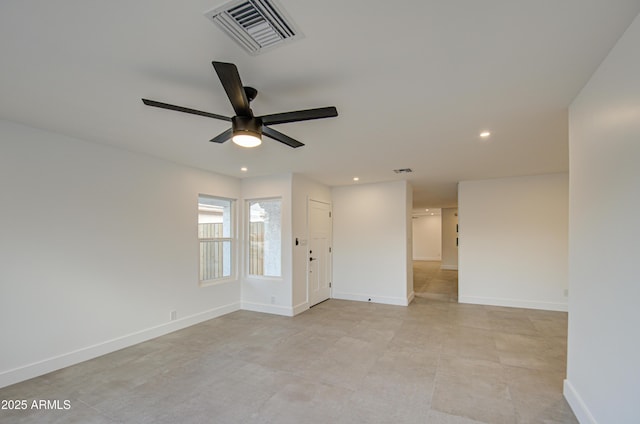 spare room featuring ceiling fan