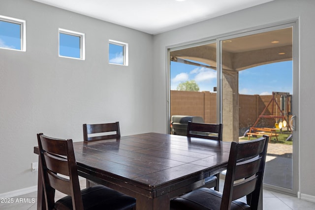 25974 W Horsham Dr, Buckeye, AZ 85396 - dining room with baseboards and light tile patterned flooring