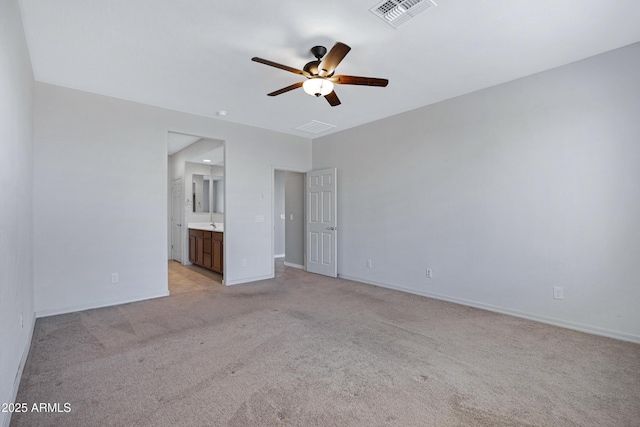 25974 W Horsham Dr, Buckeye, AZ 85396 - unfurnished bedroom with light carpet, ensuite bath, and ceiling fan