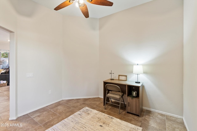 13724 N Wild Hazel Ln, Marana, AZ 85658 - home office featuring ceiling fan, baseboards, and tile patterned flooring