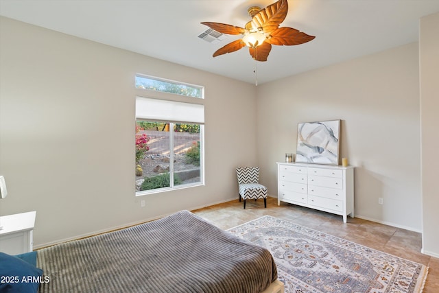 13724 N Wild Hazel Ln, Marana, AZ 85658 - bedroom featuring a ceiling fan, baseboards, tile patterned flooring, and visible vents