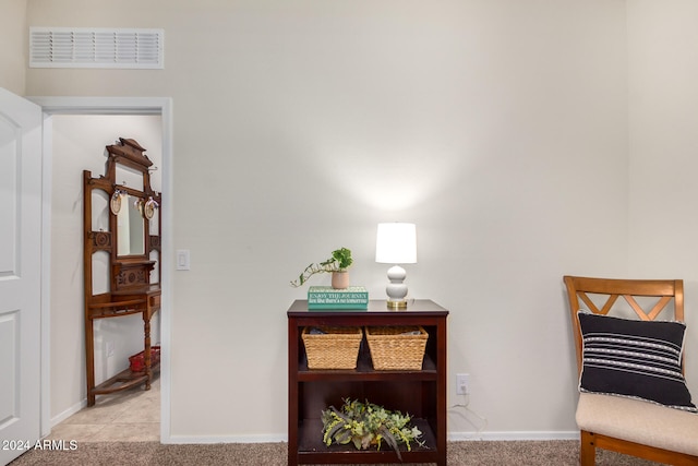 sitting room with light carpet