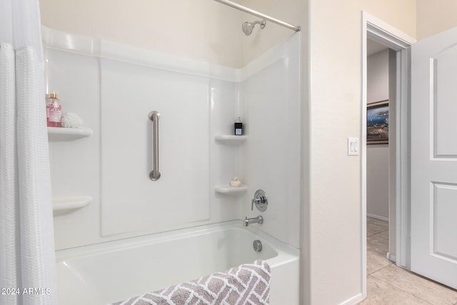 bathroom with tile patterned flooring and shower / bathtub combination with curtain