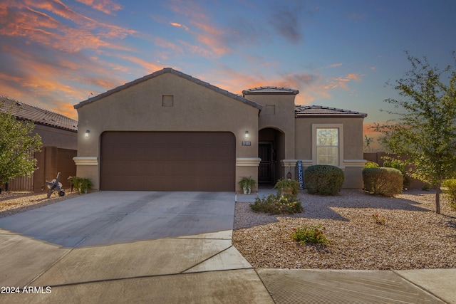 view of front of home featuring a garage