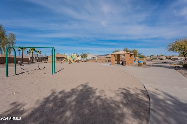 view of home's community with a playground