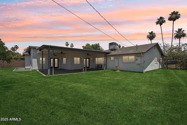 615 E Winter Dr, Phoenix, AZ 85020 - rear view of house featuring a ceiling fan, stucco siding, and a patio area