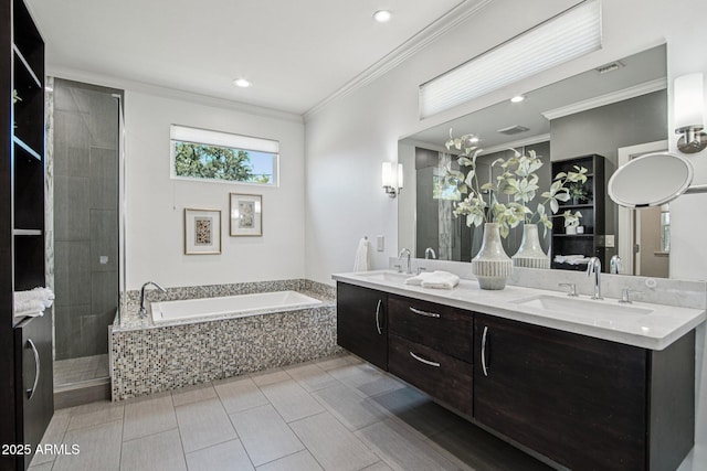 615 E Winter Dr, Phoenix, AZ 85020 - full bath with a garden tub, double vanity, crown molding, tiled shower, and recessed lighting