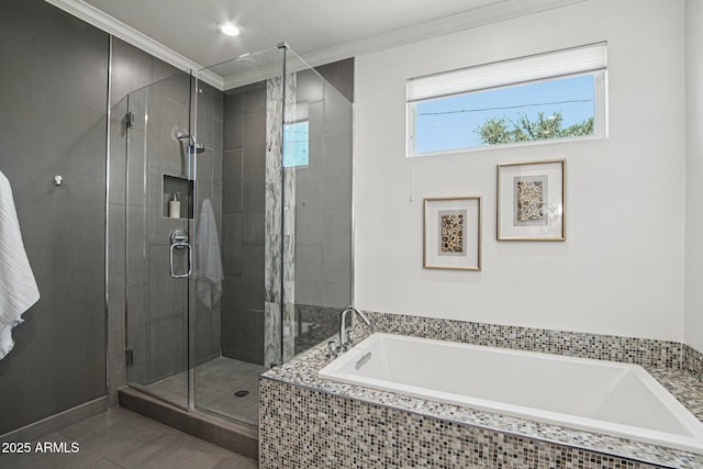 615 E Winter Dr, Phoenix, AZ 85020 - bathroom featuring a garden tub, a shower stall, and ornamental molding