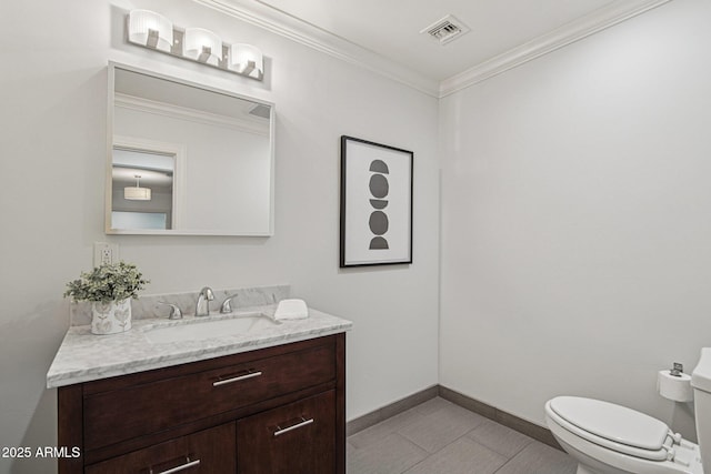 615 E Winter Dr, Phoenix, AZ 85020 - half bathroom with vanity, crown molding, and tile patterned flooring