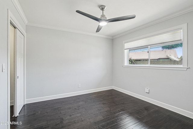 615 E Winter Dr, Phoenix, AZ 85020 - unfurnished bedroom featuring dark wood finished floors, ornamental molding, a closet, and ceiling fan