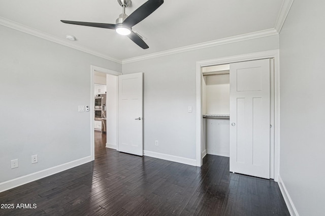 615 E Winter Dr, Phoenix, AZ 85020 - unfurnished bedroom featuring ornamental molding, dark wood finished floors, ceiling fan, and a closet