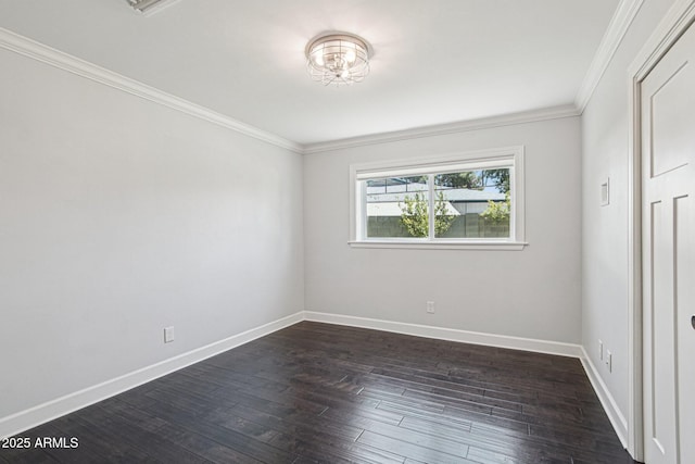 615 E Winter Dr, Phoenix, AZ 85020 - unfurnished bedroom with ornamental molding and dark wood-type flooring