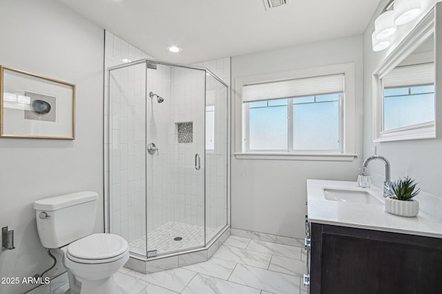 615 E Winter Dr, Phoenix, AZ 85020 - bathroom featuring vanity, marble finish floors, plenty of natural light, a stall shower, and recessed lighting