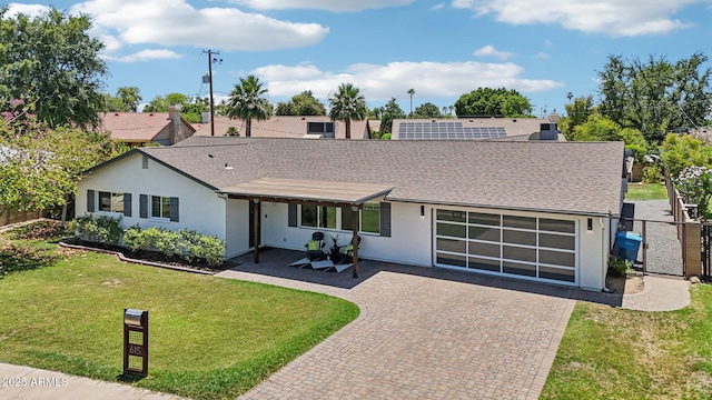 615 E Winter Dr, Phoenix, AZ 85020 - view of front of property featuring decorative driveway, stucco siding, and roof with shingles