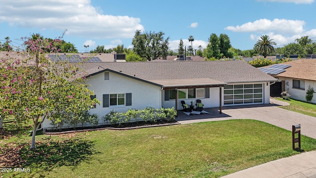615 E Winter Dr, Phoenix, AZ 85020 - single story home with stucco siding, a front lawn, driveway, and an attached garage
