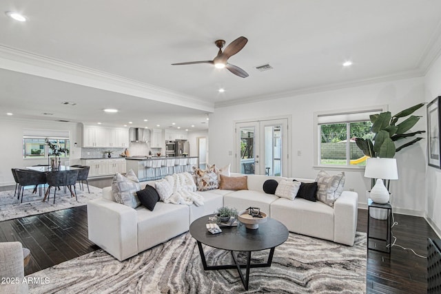 615 E Winter Dr, Phoenix, AZ 85020 - living area featuring dark wood finished floors, ceiling fan, recessed lighting, and ornamental molding