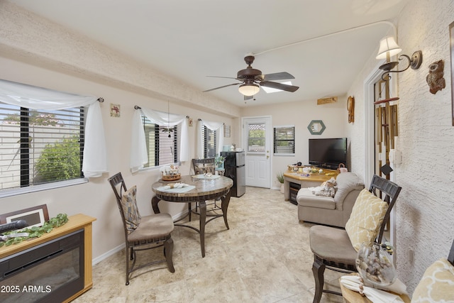 living room with ceiling fan