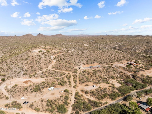 drone / aerial view featuring a mountain view