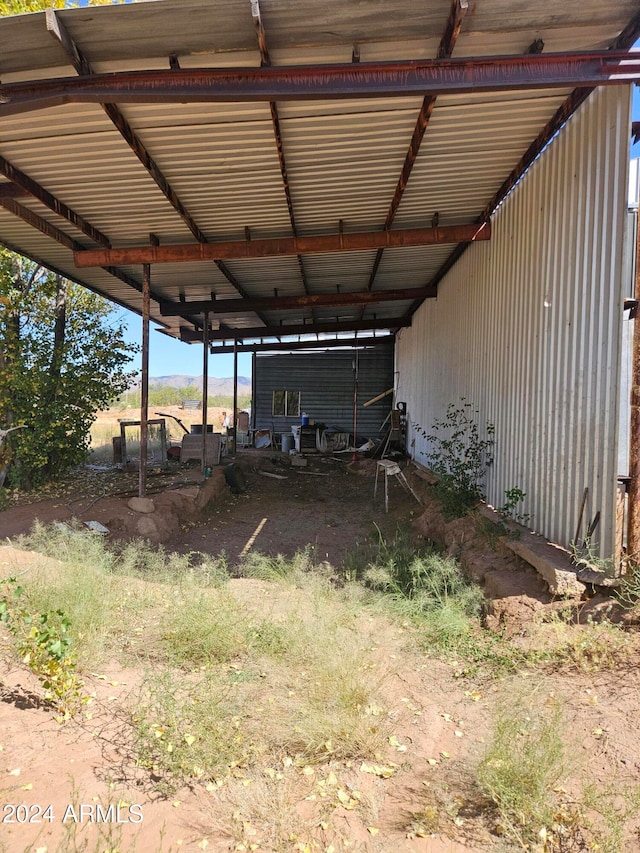 exterior space featuring an outbuilding