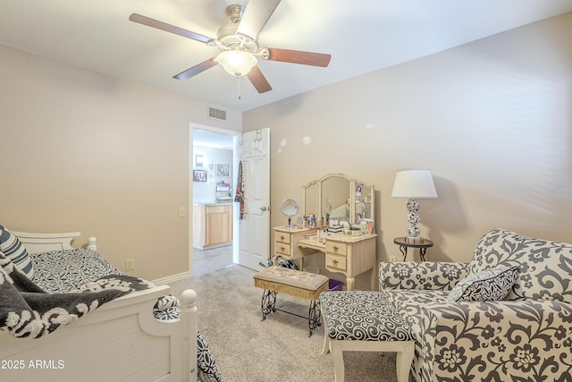 living room featuring baseboards, ceiling fan, visible vents, and carpet flooring