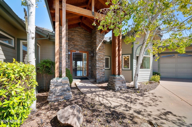 entrance to property featuring a garage