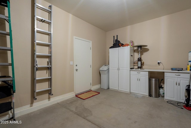 interior space with baseboards