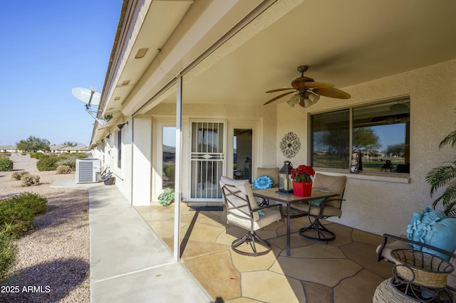 view of patio featuring cooling unit and ceiling fan