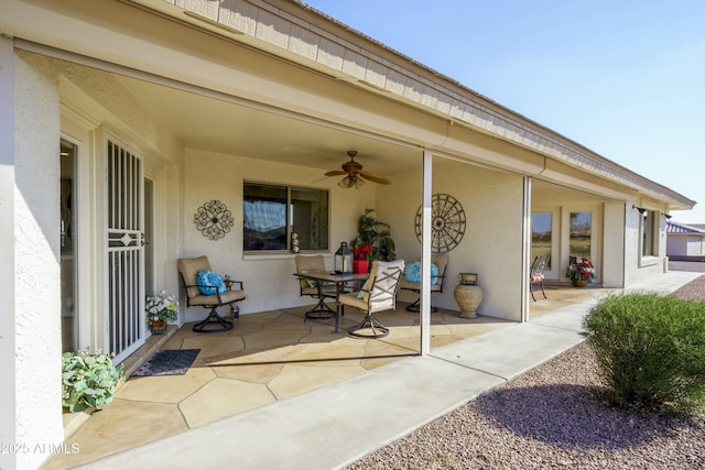 view of patio / terrace featuring ceiling fan