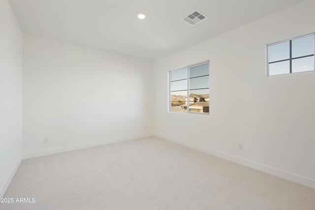 empty room featuring carpet flooring