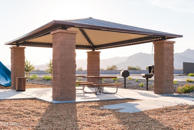 view of community featuring a gazebo and a mountain view