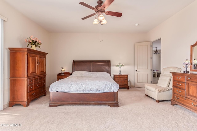 bedroom with light carpet and ceiling fan