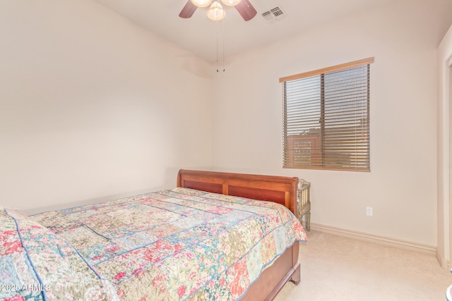 bedroom featuring ceiling fan and light colored carpet