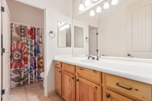 bathroom with tile patterned flooring, vanity, toilet, and a shower with shower curtain