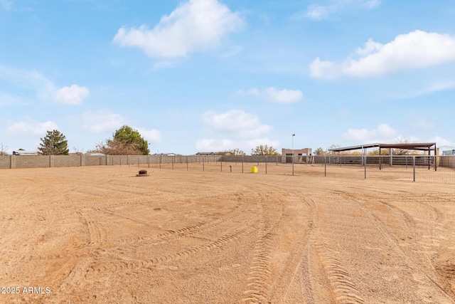 view of yard with a rural view