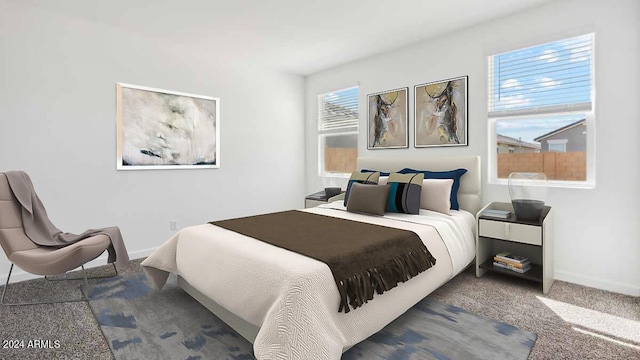 bedroom with carpet floors and baseboards
